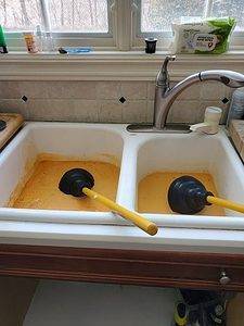 Clog kitchen sink